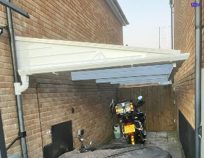 White GRP Cantilever Carport installed in Plymouth