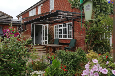 Black Cantilevered Veranda with Circles