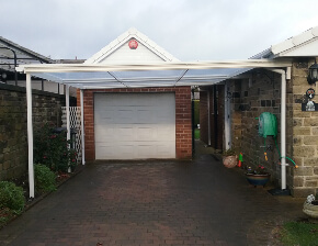 White Traditional Canopy Carport on a Bungalow