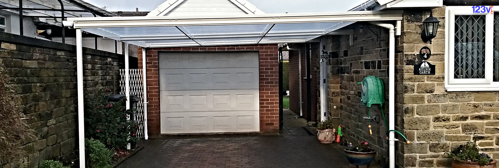 White Traditional Canopy Carport on a Bungalow