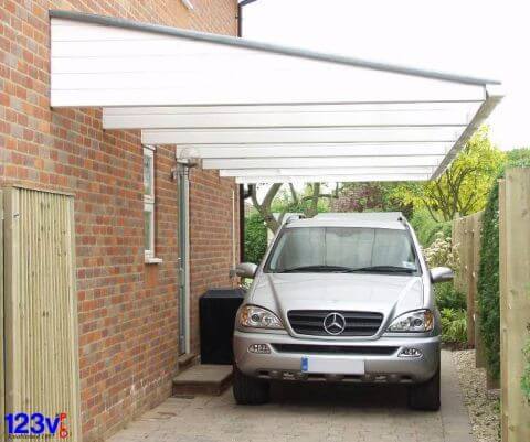 White Carport Cantilevered Sheltering Mercedes